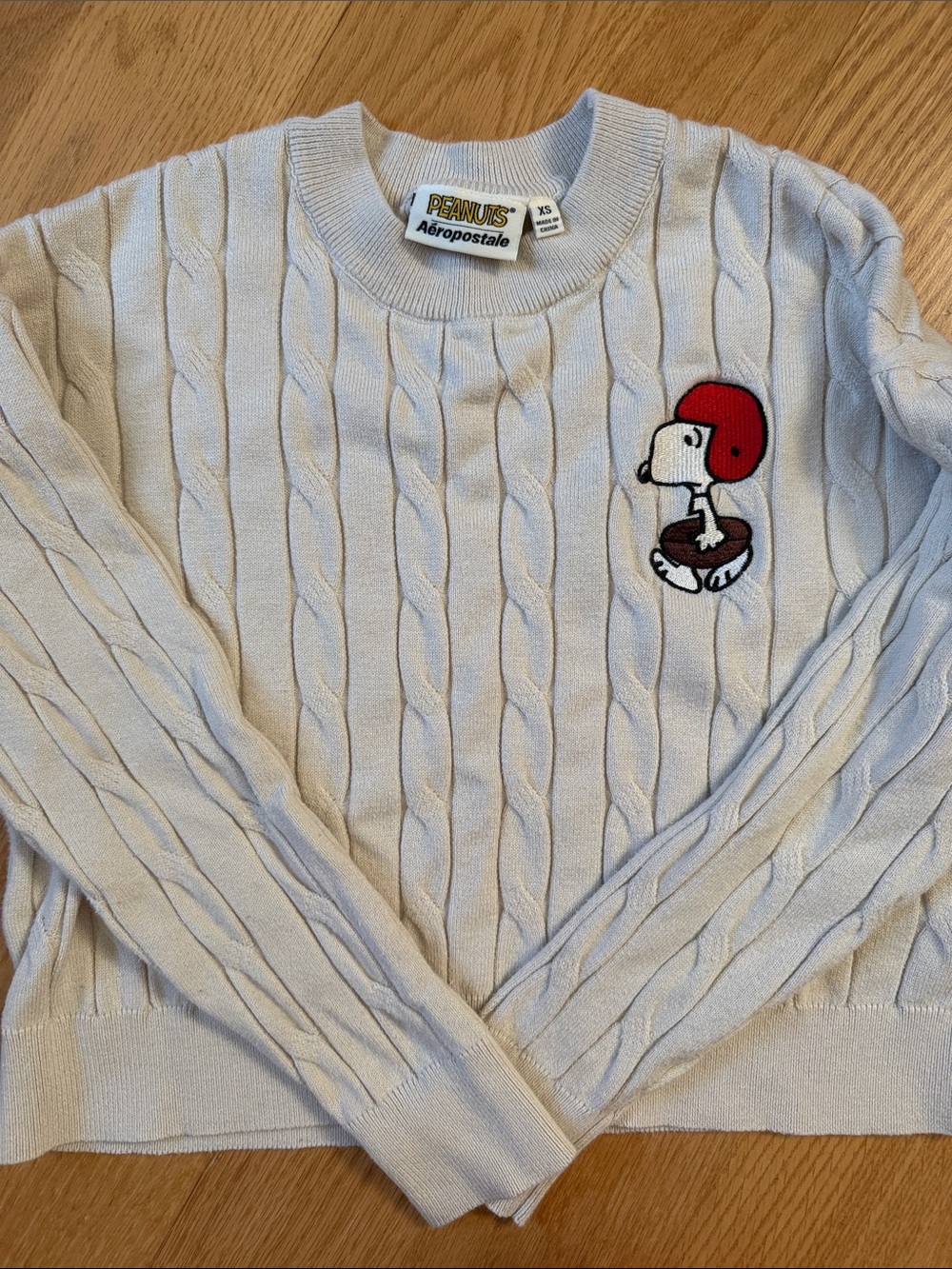 Aeropostale Peanuts Snoopy Crewneck Sweater in Light Cream XS